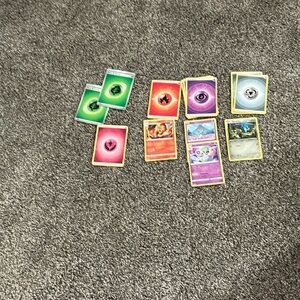 Pokémon bundle, including energy, power ups, and cards